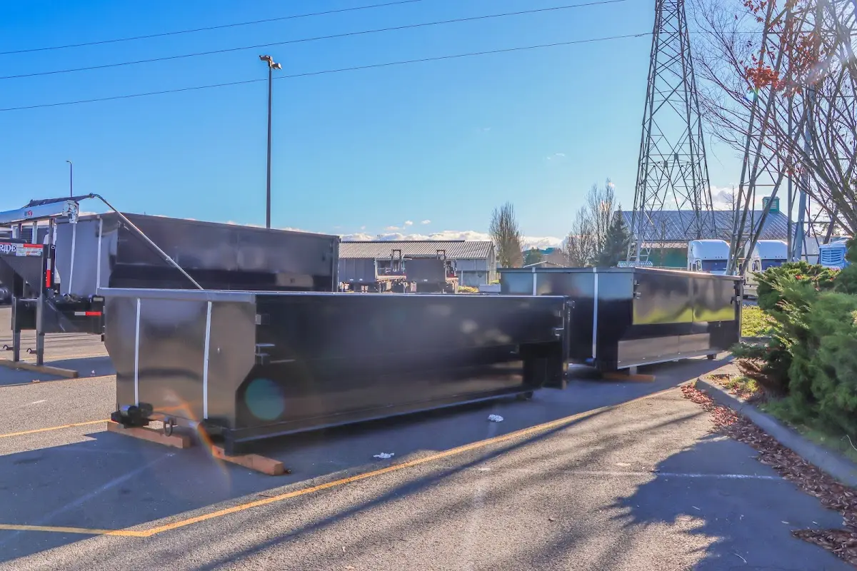 Roll-off dumpster ready for waste disposal at job site for Commercial Dumpster Rental in Port Salerno